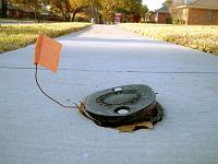 10637 bent flag in sidewalk 